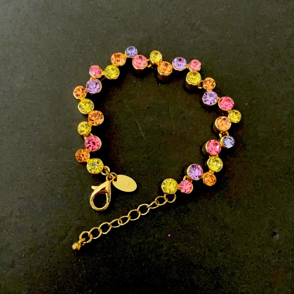 Multi colored stone gold tone bracelet by Cookie Lee